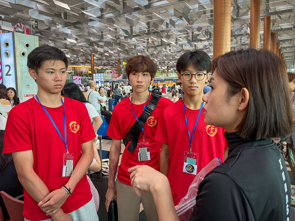 Coach Jennee briefing the boys Coach Jennee briefing the boys