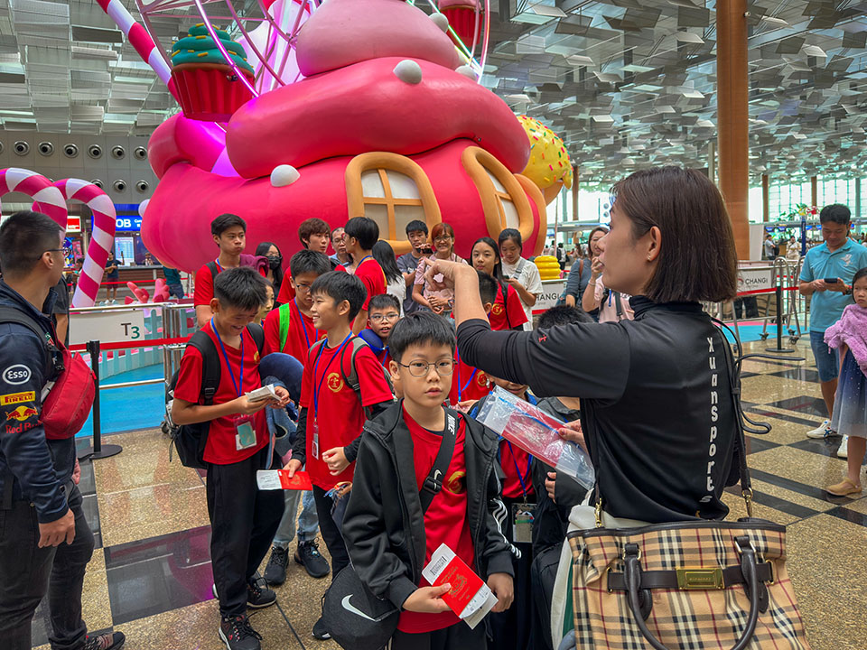 Coach Jennee with the athletes Coach Jennee with the athletes
